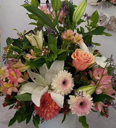 Pastel Pink - A lovely container arrangement, created using the fresh blooms of the day in all pale pink and white with complementary foliage.